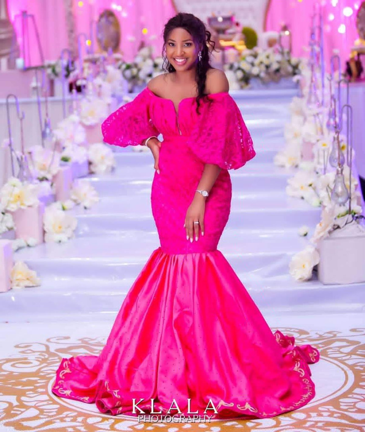 Second portrait of a fuchsia lace and satin mermaid gown