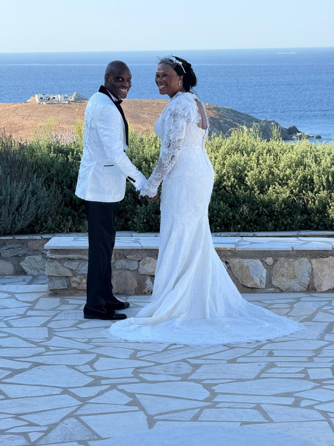 Bride and groom by the Mediterranean sea