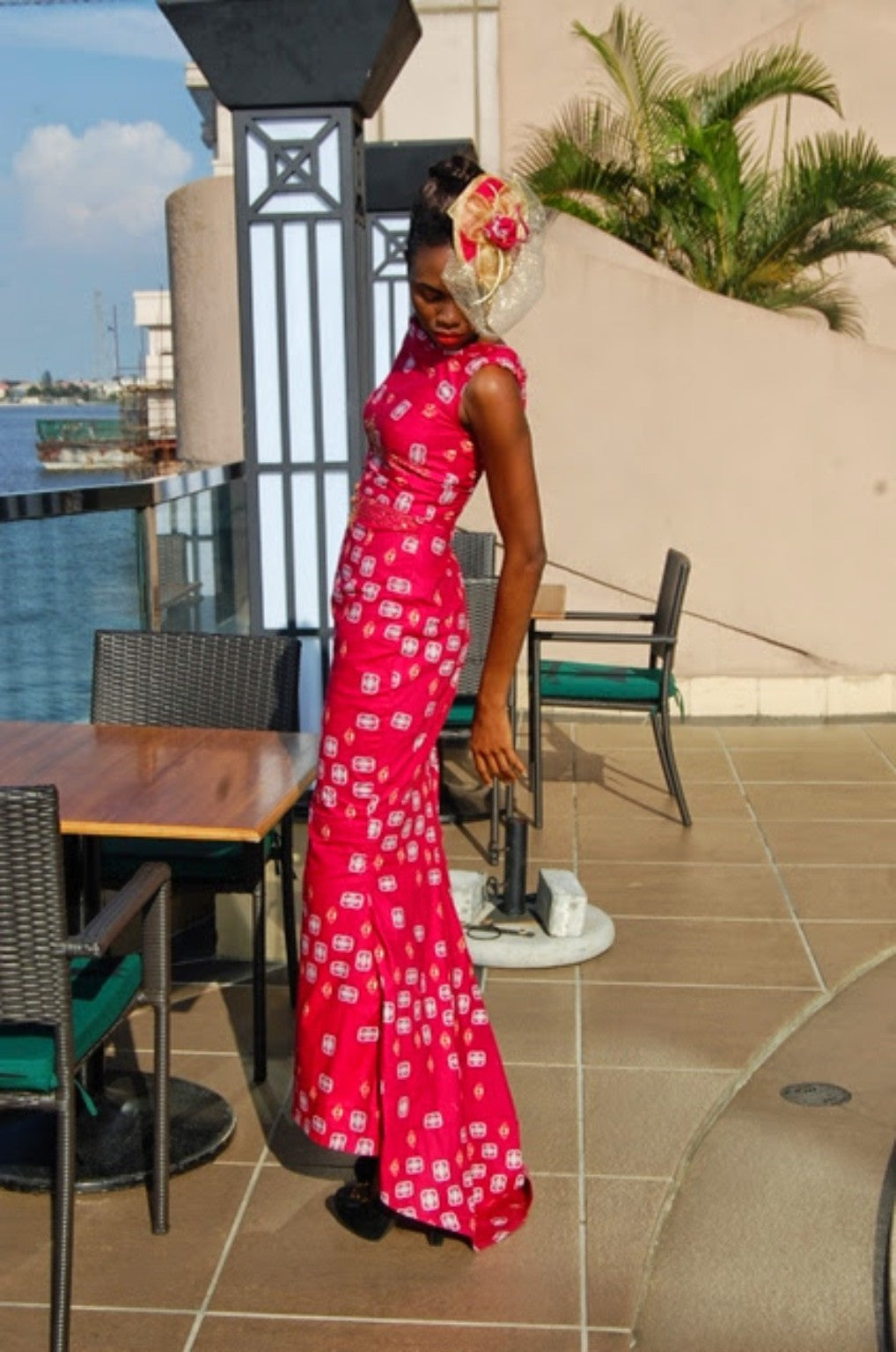 Alternative fuchsia printed gown photographed by the waterfront