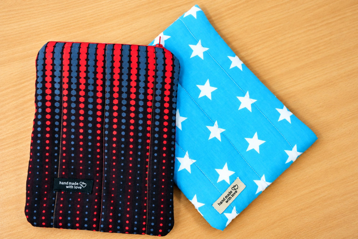 Book, Tablet and Laptop Sleeve sewing pattern - two finished sleeves on table