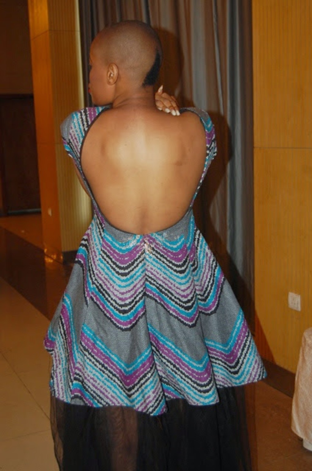 Early Tolumi TFP sculptural open-back look