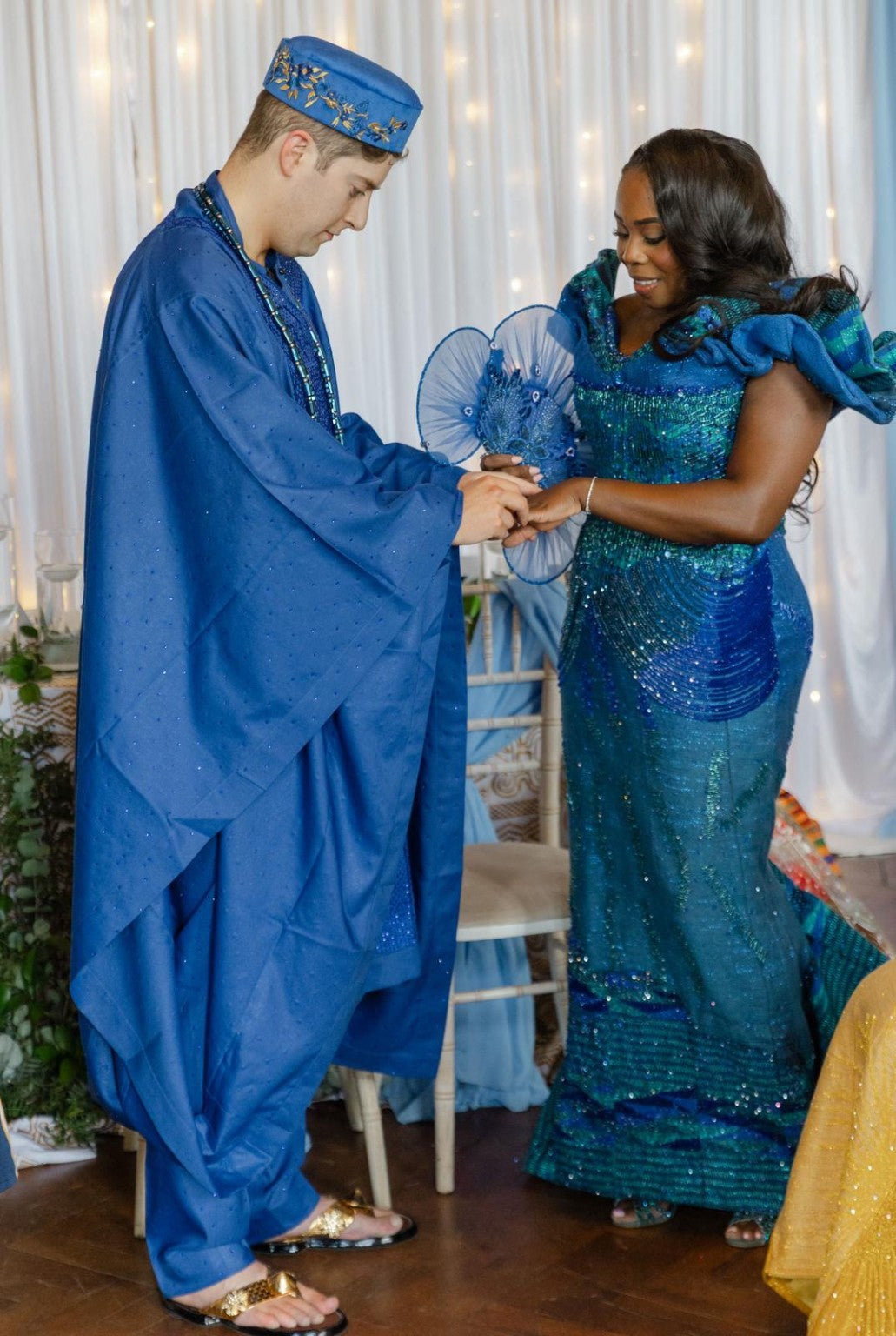 Blue ceremonial menswear and coordinated women’s occasionwear