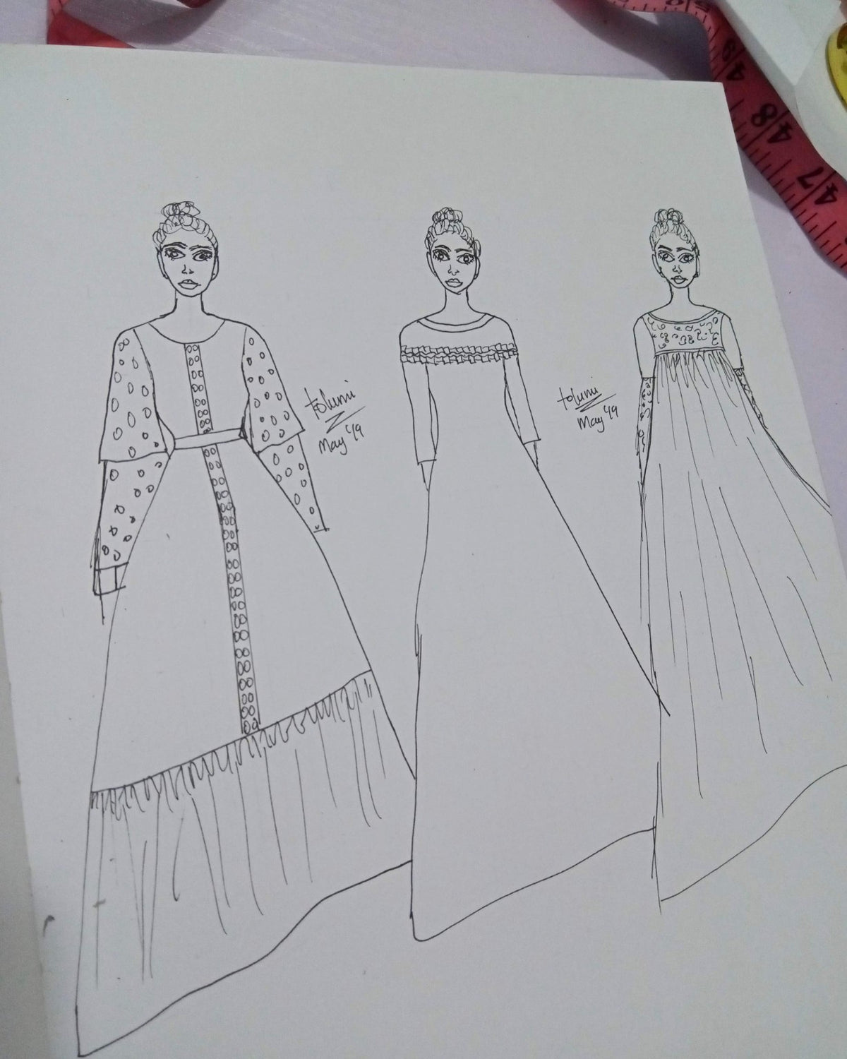 Hand-drawn fashion design sketches